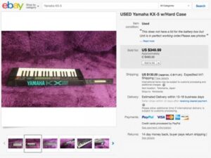 Screenshot of an eBay listing for a used Yamaha KX-5 keytar with a hard case. The main image shows the black and white keytar, with its case open. Price and shipping details are visible on the right.