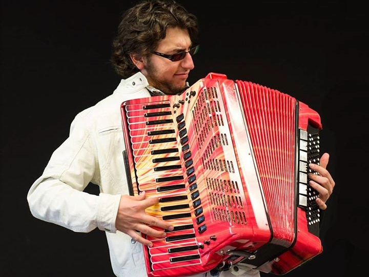 Man playing accordian.