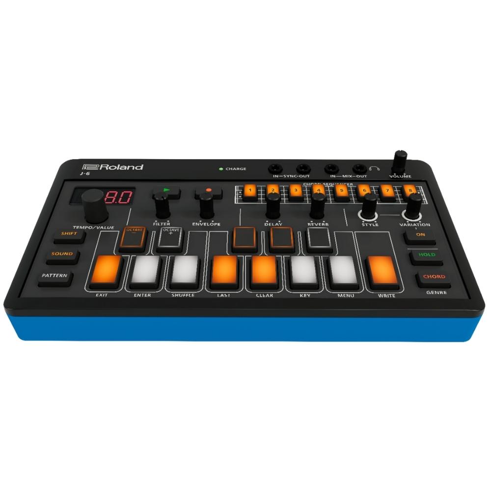 A compact Roland electronic music synthesizer with orange, white, and black buttons, various knobs, a small digital display, and a blue base, designed for music production and sound creation.