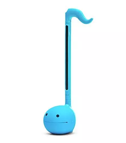 A blue plastic musical instrument shaped like a musical note with a round, smiling face at the base and a long neck ending in a curved hook.