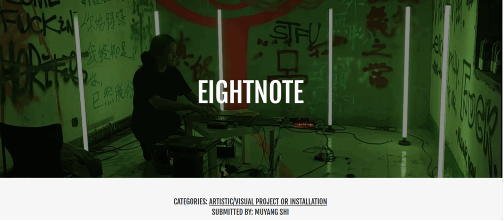 A person sits at a table with electronic equipment in a room lit by green lights, surrounded by graffiti-covered walls and vertical light tubes. Text overlay reads EIGHTNOTE.