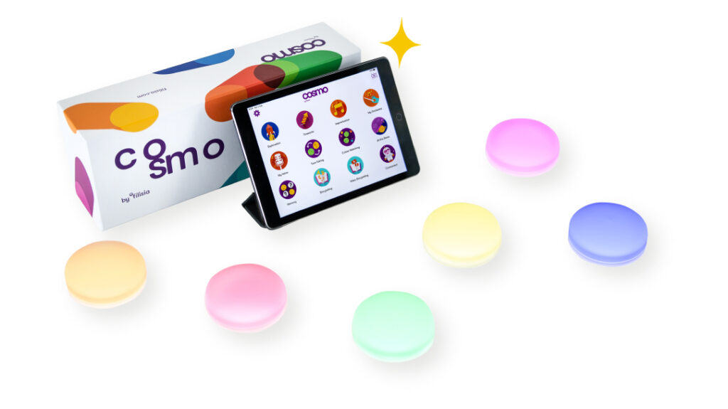 A tablet displaying colorful icons is set next to a Cosmo-branded box and six round, pastel-colored touch buttons. A yellow sparkle graphic appears above the tablet.