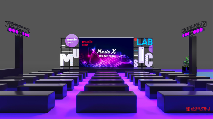 A modern event stage setup with black benches, a large screen displaying “Music X” with purple wave graphics, and illuminated letters spelling “MUSIC LAB.” Two lighting rigs and a plant are on either side of the stage.