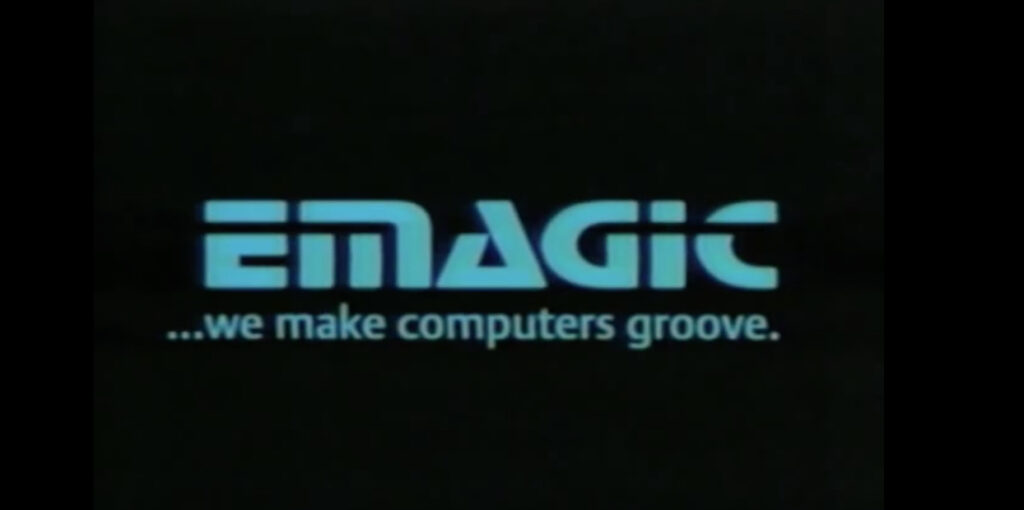 Blue text on a black background reads EMAGIC in a stylized font, with the slogan ...we make computers groove. written below in lowercase letters.