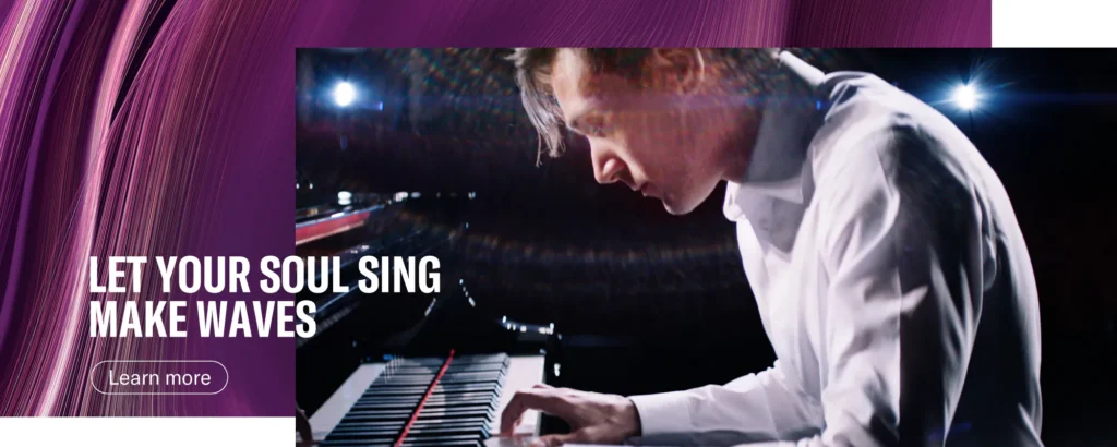 A person in a white shirt plays a grand piano on stage under dramatic lighting. Text reads, “LET YOUR SOUL SING MAKE WAVES.” A Learn more button appears below the text.